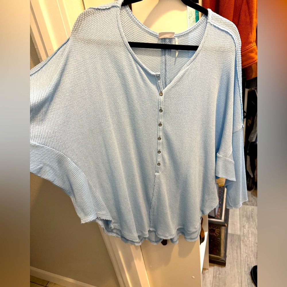 Women’s light blue top. Oversized and flowy